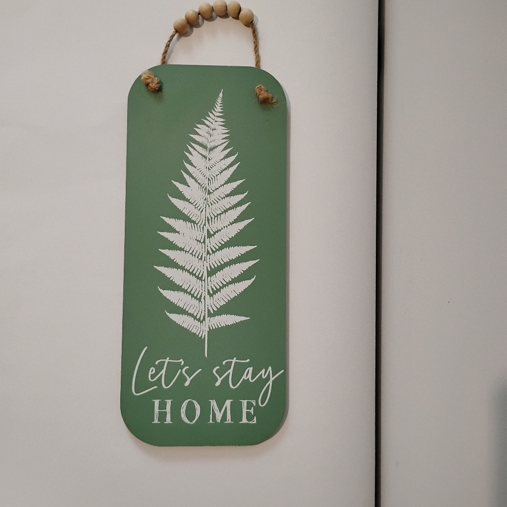 Green and White Wall Decor Sign